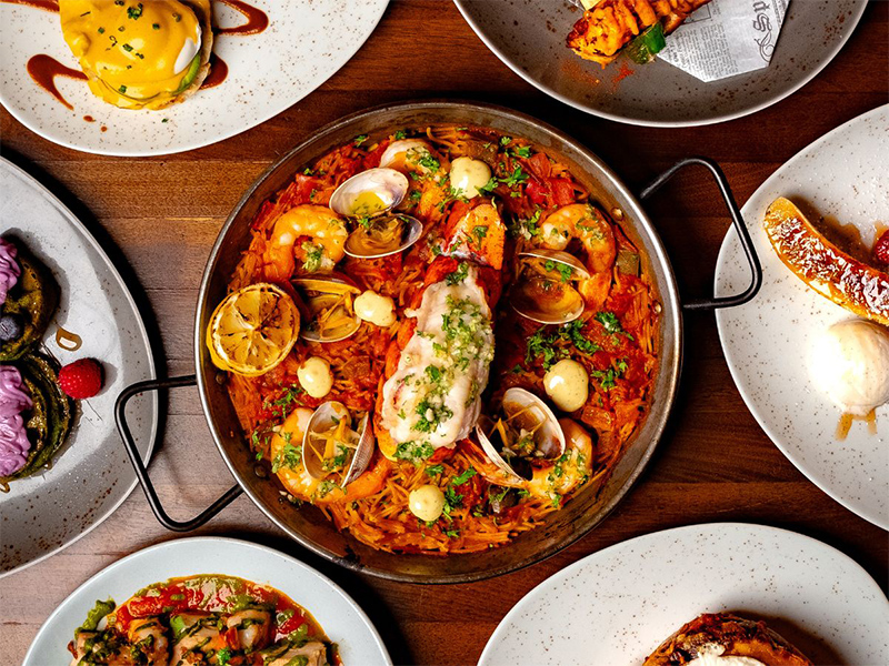 a pan of bright seafood on a table